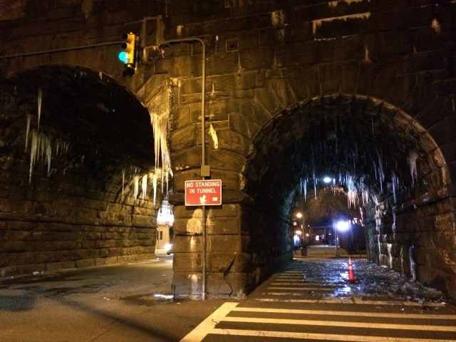 The "No Standing" sign offers good advice when the icicles start to melt. C. Nelson, 2014.