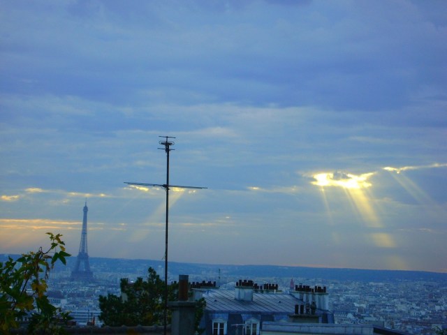 Sun breaking through on the Eiffel Tower. Photo: Craig Nelson